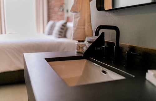 Jacksonville Hotel | Boutique 1 BR King Guest Room in historic Jacksonville, OR. Features a plush King bed, Nespresso machine, and charming Inn details. Perfect for a comfortable, walkable downtown escape.