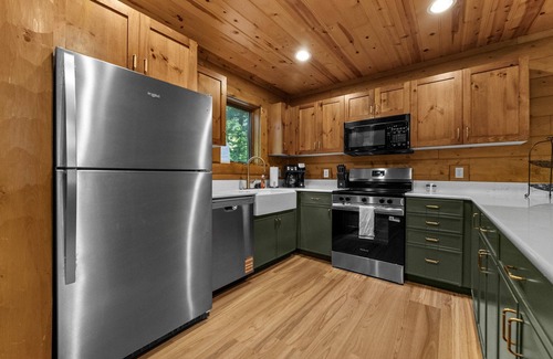 Boyne City Cabaña | Boyne Mountain Cabin with Hot Tub Next to Skiing and Golf!