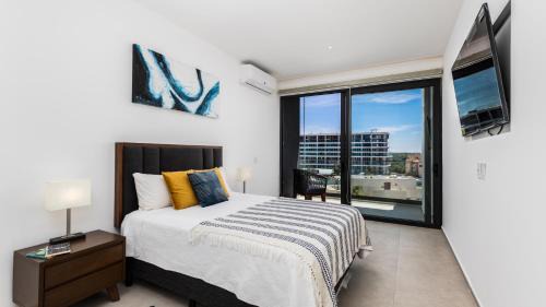 Flamingos Apartamento | Brand New Condo Aria Ocean 501 by Kivoya