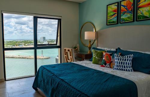 Puerto Yucalpetén Apartamento | Breathtaking 2BR deluxe condo with stunning views