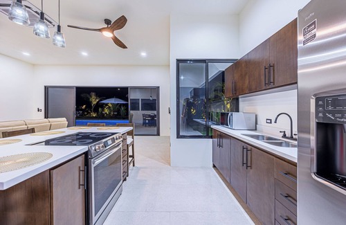 Palma Quemada Casa | Breathtaking Custom Home-Guest House Walk to “Playa Linda” and to “Rio Hatillo”