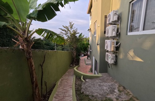 IronShore Estates Cabaña | Breathtaking Luxury cottage in Ironshore with AC, WiFi, Home Theater & Much more