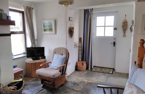 Dunfanaghy Cabaña | Breifne Cottage, tradicional cabaña de piedra con vistas sobre la bahía de Dunfanaghy