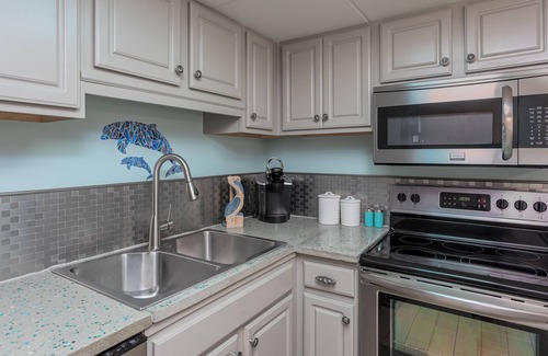 Villa Sabine Condominio | Condominio temático brillante y divertido en la playa - en Little Sabine Bay