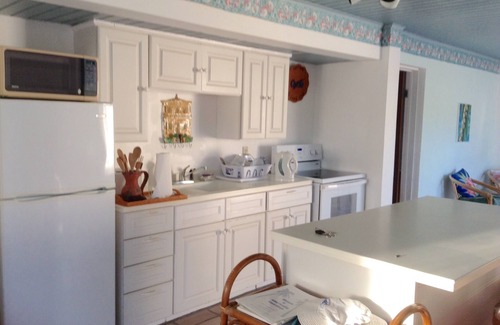 Frigate Bay Condominio | Brillante, Breezy Condo en la costa Palmy