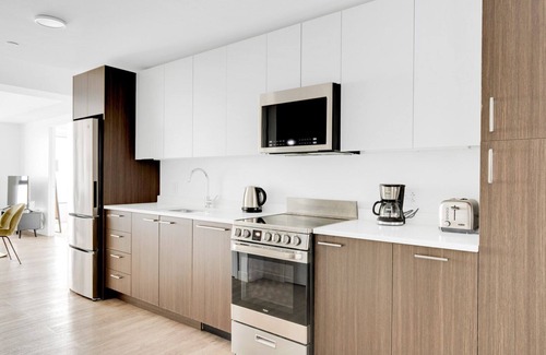 Central Square Apartamento | Bright Central Square 1BR w/ Gym, W/D & Roof, near T, by Blueground