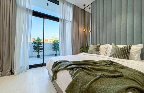 Discovery Gardens Apartamento | Bright New Studio with Pool & Gym Access, 5 min from Gardens Metro