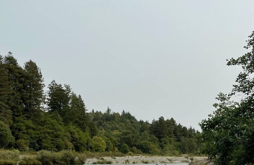 Crescent City Casa | Bright, open concept, family friendly house, private sandy beach on the river