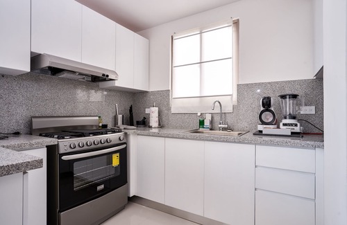 La Julia Apartamento | Lujoso nuevo Harmony Condo en La Julia 3