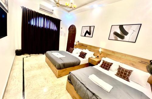 Gulshan-E-Jamal Cama Y Desayuno | Budget Friendly 2 rooms Suite Stadium Road