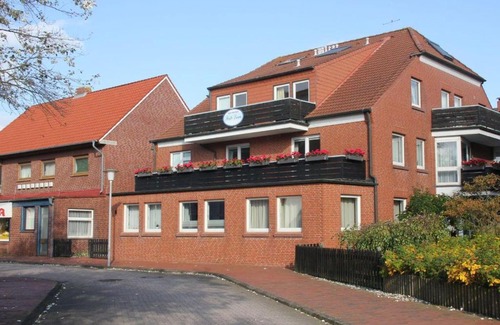 Juist Apartamento | Bullauge-im-Haus-Seute-Deern