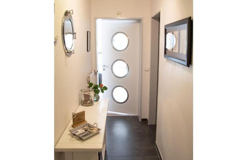 Juist Apartamento | Bullauge-im-Haus-Seute-Deern