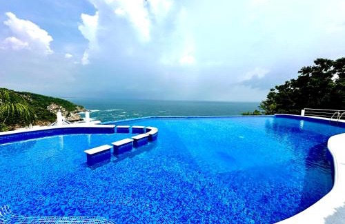 Puerto Ángel Villa | Bungalow frente a la playa estrene alberca nueva con increíble vista infinita al mar, 8 hermosas playas cercanas, terraza con cama de playa, espectacular vista al inmenso océano pacífico, 2 kayack disponibles, nómadas digitales Starlink WiFi 224 mbps