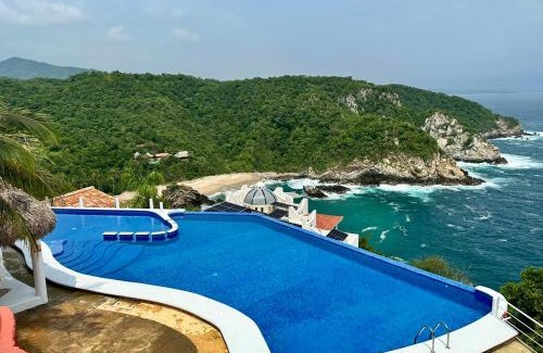Puerto Ángel Villa | Bungalow frente a la playa estrene alberca nueva con increíble vista infinita al mar, 8 hermosas playas cercanas, terraza con cama de playa, espectacular vista al inmenso océano pacífico, 2 kayack disponibles, nómadas digitales Starlink WiFi 224 mbps