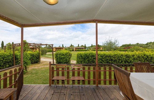 Bibbona Casa | Bungalow 'Stella 1' con piscina compartida, terraza privada y aire acondicionado