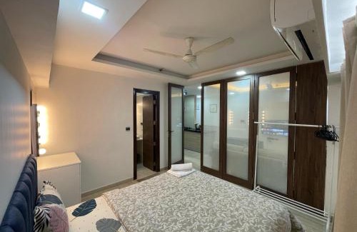 Kurla Apartamento | Business-Ready Apt near Jio World Centre 1BR Gym Pool WiFi