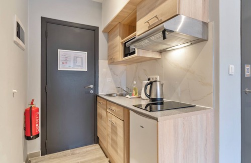 Leuven Apartamento | Estudio de negocios con dos camas individuales en Budget Flats Leuven