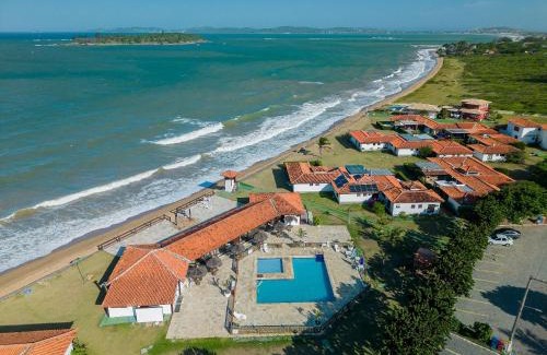 Praia Rasa Casa | Casa Bz60 en condominio justo en la arena