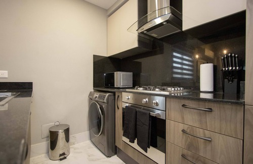 Yolanda Morales Apartamento | Céntrico con Piscina+bbq+gym+espacio de Trabajo y Personal en el Lobby 24/7