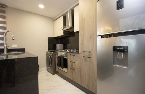 Yolanda Morales Apartamento | Céntrico con Piscina+bbq+gym+espacio de Trabajo y Personal en el Lobby 24/7