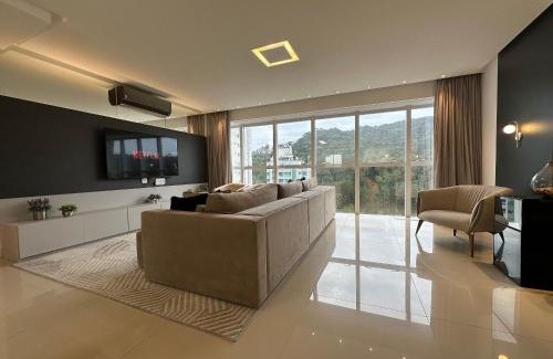 Pioneiros Apartamento | CA01- 4 Suítes| Alto Padrão | 2 Garagens| Churrasq