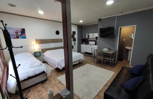 Punta Arenas Apartamento | Cabaña de John Wine