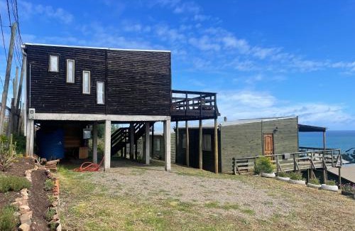 Curanipe Casa | Cabañas Refugio Costero