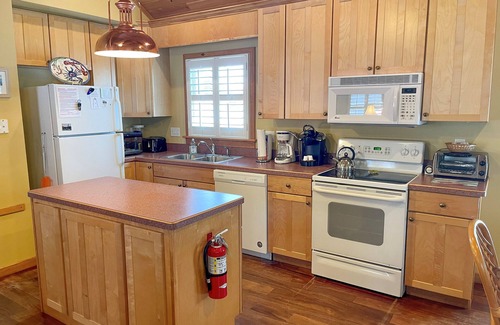 Ocracoke Condominio | Cabana IV: Escapada perfecta para dos que ofrece una piscina compartida.