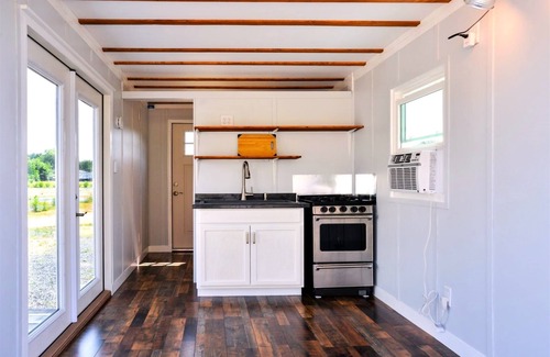 Colonial Beach Cabaña | Cabernet Cottage on Water at Monroe Bay Winery, tiny container cottage