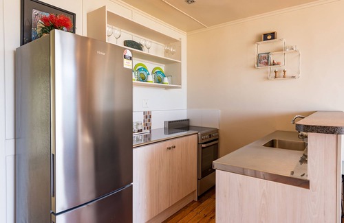 Cable Bay Apartamento | Golden Sand Beachfront Accommodation
