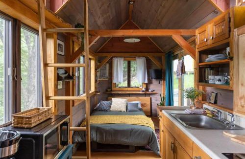 Johnson Casa | Caboose Tiny Home on river with hot tub near Stowe