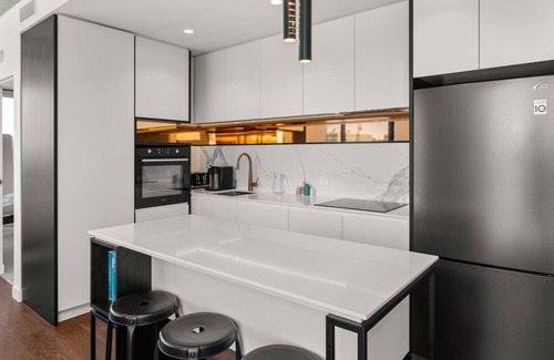 Cremorne Apartamento | Camillea - One-bedroom fifth-floor residence with MCG and city views.