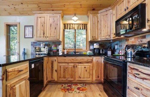 Great Cacapon Cabina | Camp Dancing Bears -riverfront, wifi, fire pit, fireplace, grill, king