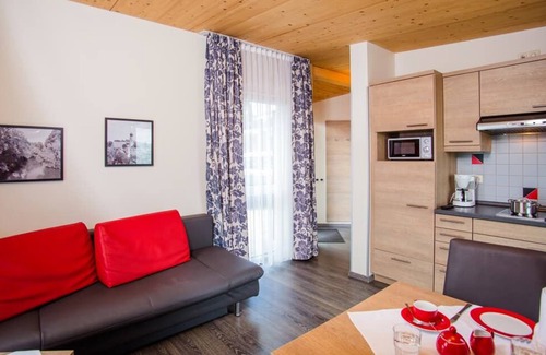 Bad Griesbach im Rottal Apartamento | Suite de acampada / bungalow de dos habitaciones con chimenea y terraza.