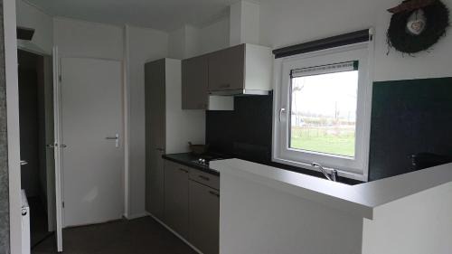 Remersdaal Chalet De Esquí | Camping Natuurlijk Limburg - chalet 4p