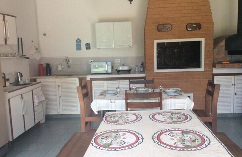 Vila Natal Chalet De Esquí | Campos do Jordão - Suite with living room, on the mountain overlooking the woods