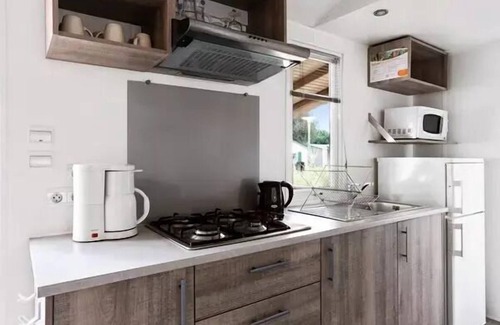 Saint-Amans-des-Cots Casa | Campsite Domaine des Tours**** - Comfort XL 3-room mobile home 4 adults + 2 children