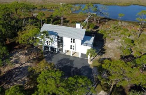 Plantation Casa | Canal- Bay Front family home 5-bedroom Sleeps 18 POOL coming soon Boat Dock