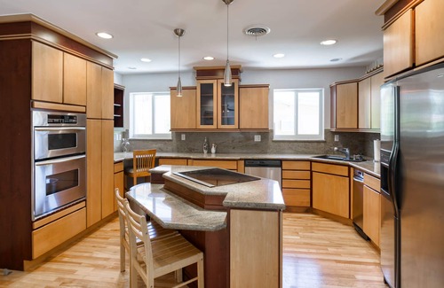 Cypress Lakes Casa | Canal-front home with pool, dock, patio, grill, sundeck, AC & washer/dryer