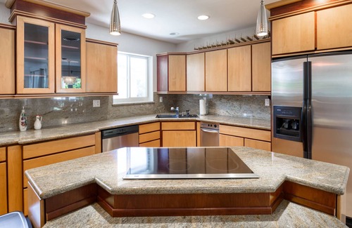 Cypress Lakes Casa | Canal-front home with pool, dock, patio, grill, sundeck, AC & washer/dryer