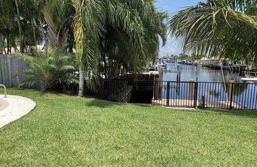 Garden Isles Casa | Canal home with pool and great sunset view!