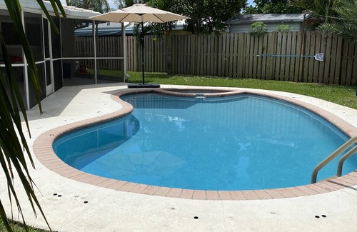 Garden Isles Casa | Canal home with pool and great sunset view!