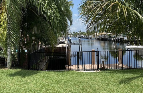 Garden Isles Casa | Canal home with pool and great sunset view!