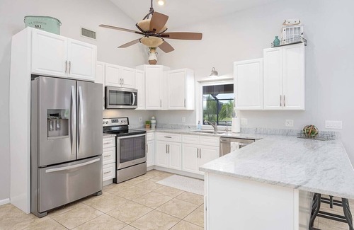 Cape Coral Casa | Canalfront/Outdoor Kitchen/Pool/Spa/Boat Dock