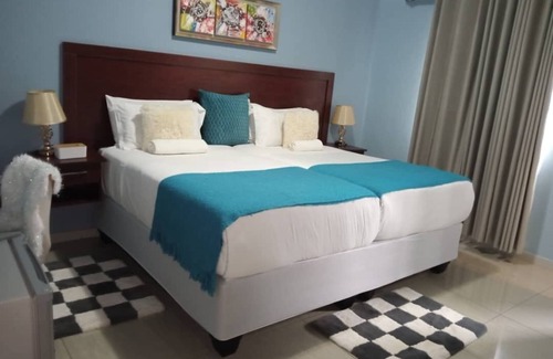 Central Cama Y Desayuno | Canna Lilly Guest House