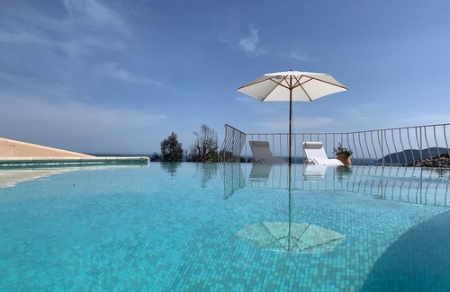 Mandelieu-La-Napoule Villa | Cannes, Provence. Villa with sensational sea views and infinity saltwater pool