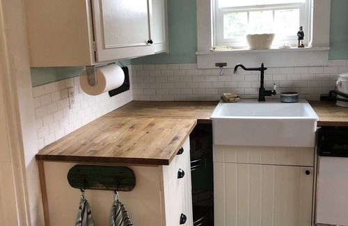 West Woodland Cabaña | Captain's Cottage, historic cottage on corner lot.