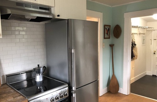 West Woodland Cabaña | Captain's Cottage, historic cottage on corner lot.
