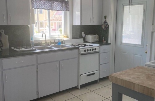 Treasure Cay Casa | CAP'n SAM's - FRENTE AL MAR CON MUELLE - INCLUYE GOLFCART $ 1242. 00 por semana