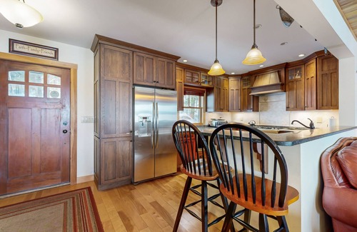 Meredith Casa | Captivating lakefront home with private dock, row boat, firepit, and lake views